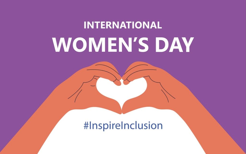 International Women's Day. IWD. 8 march. Celebrating theme Inspire Inclusion. Heart hands
